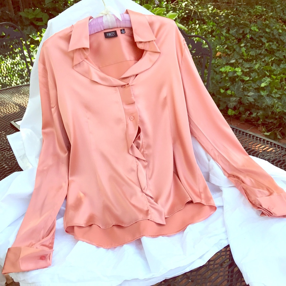 Ladies silky blouse with ruffle.